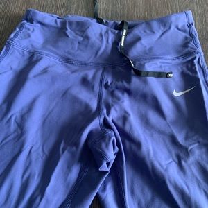 Nike Dri-FIT purple mesh leggings